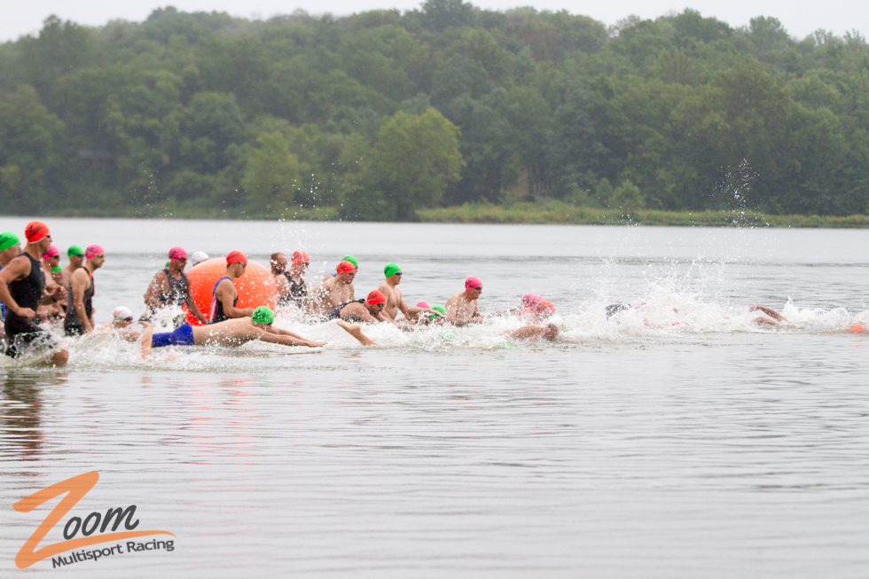 Athletes During the Swim Start at Triathlon